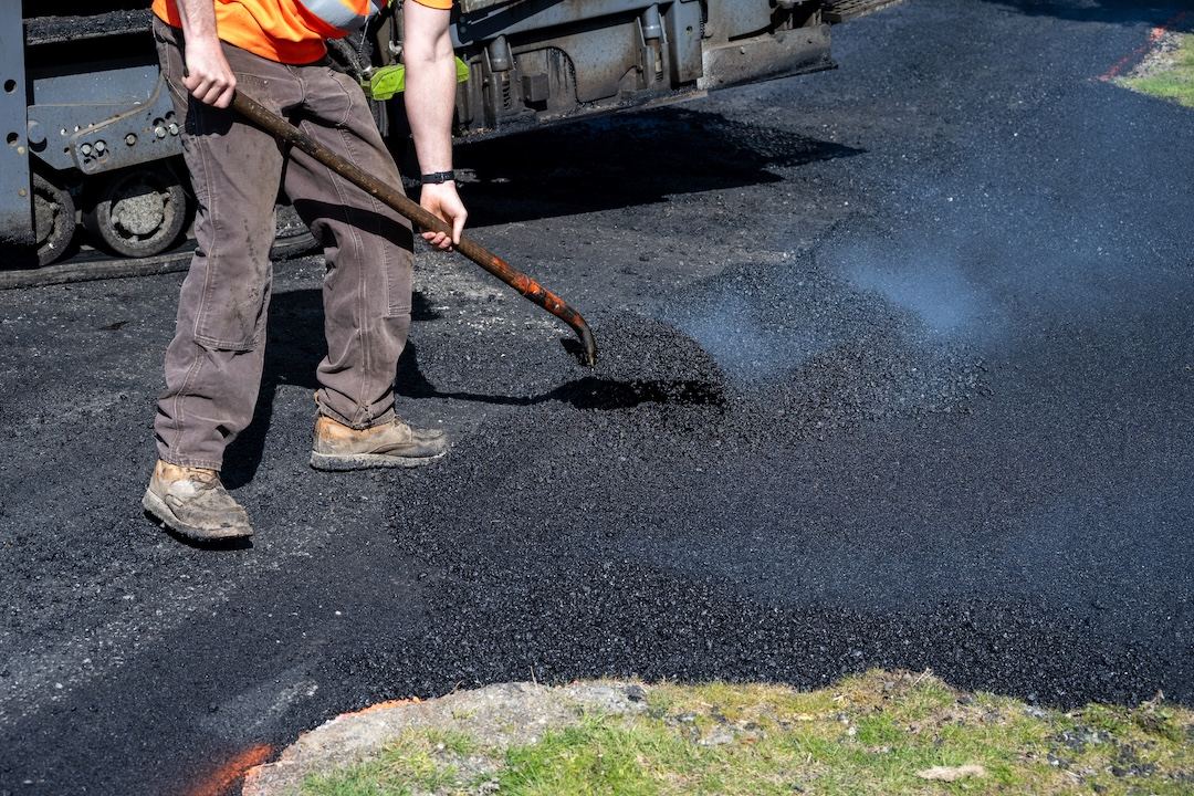 Close up of hot mix asphalt repair work