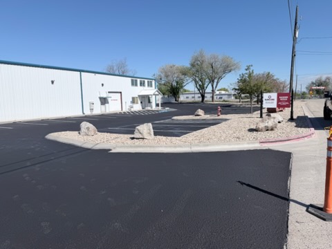 Sealcoating service result on a commercial parking lot by Supreme Seal Coat
