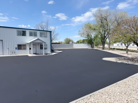 Commercial parking lot in the Treasure Valley after sealcoating by Supreme Seal Coat