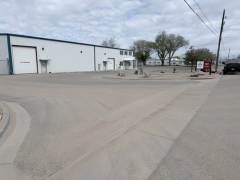 Commercial parking lot with weathered asphalt before sealcoating