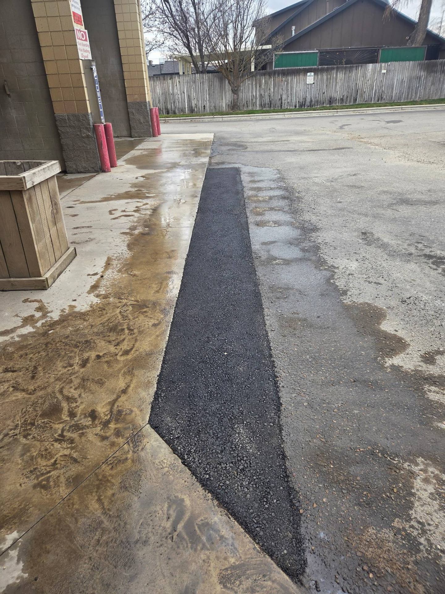 Fresh asphalt patch installed at a Treasure Valley commercial property