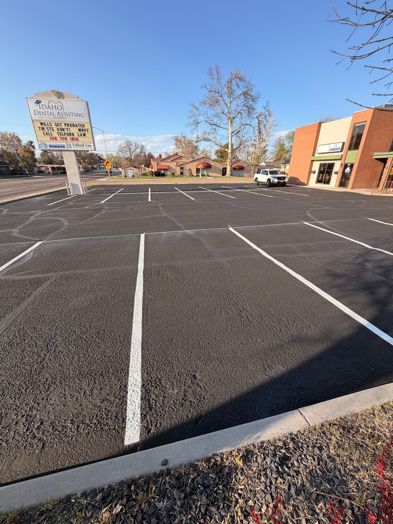 Professionally repaired and striped commercial parking lot