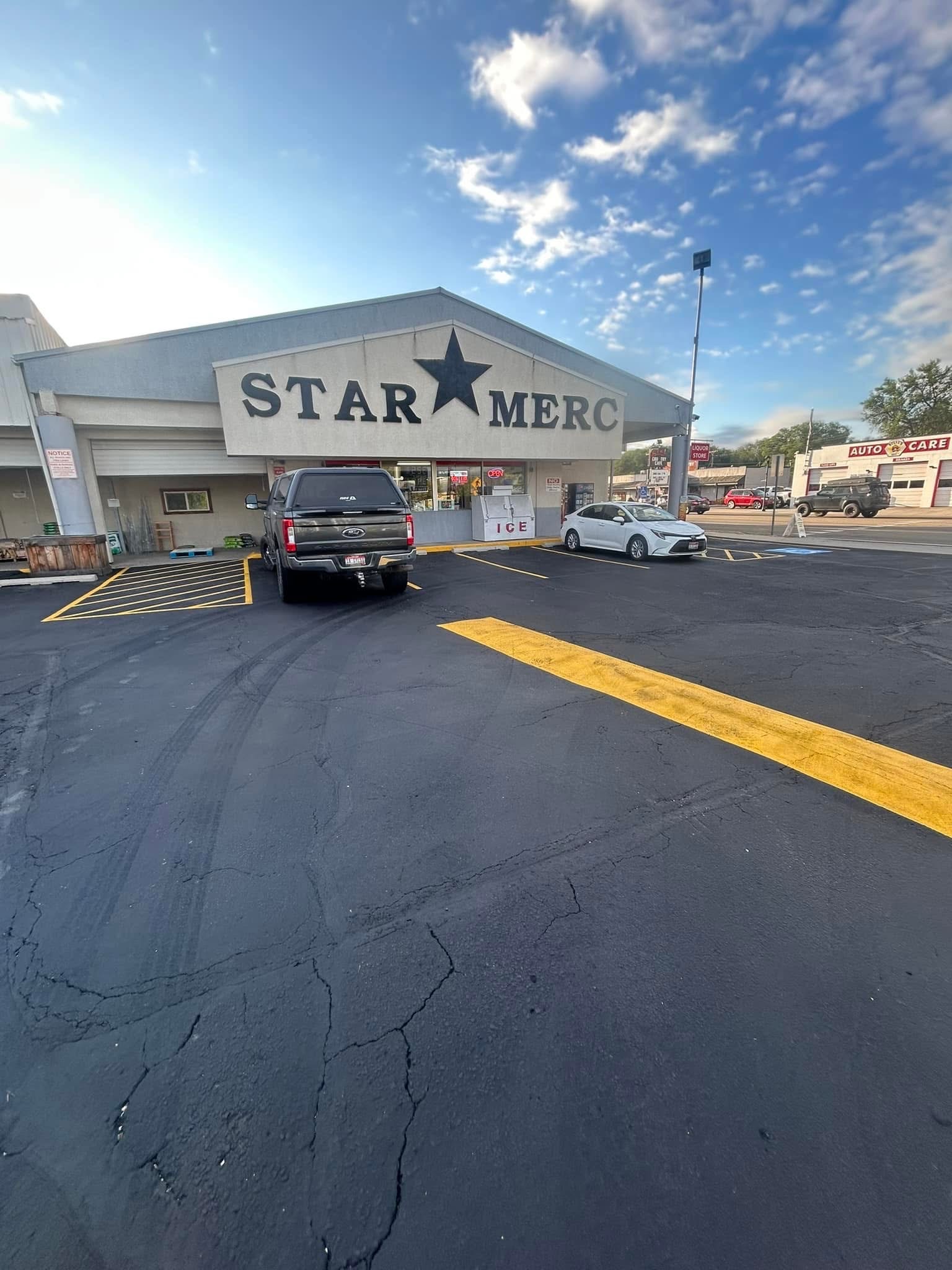 Star Merc storefront with sealcoated and striped parking lot by Supreme Seal Coat in Star, Idaho