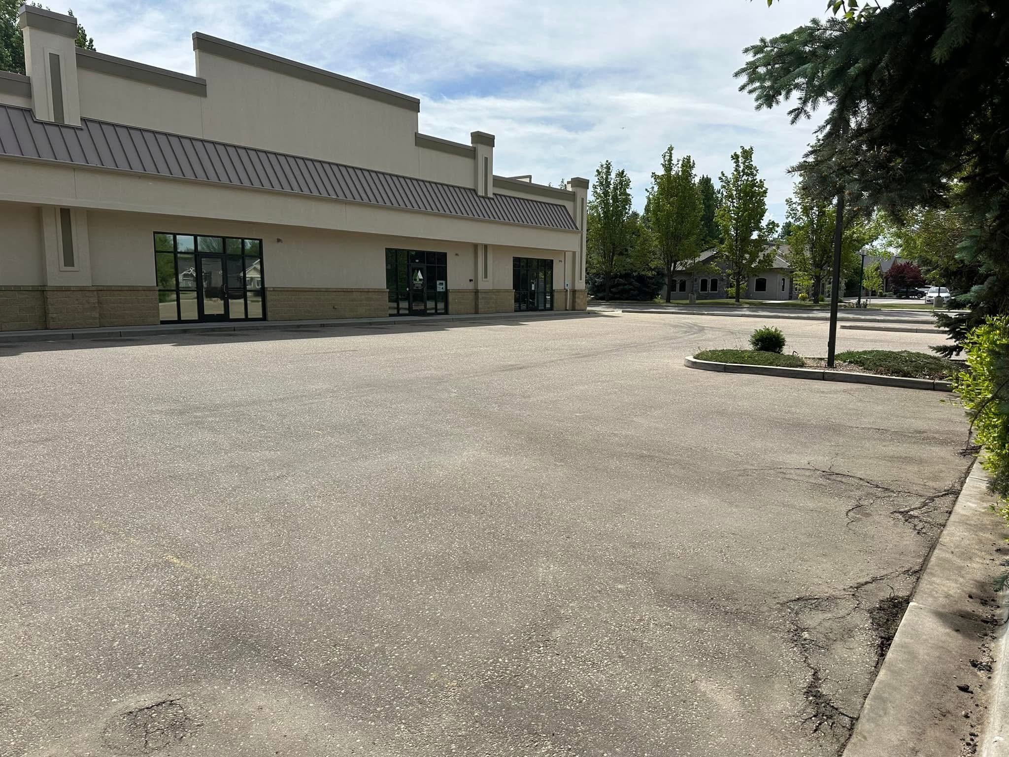 Freshly sealcoated and striped commercial parking lot