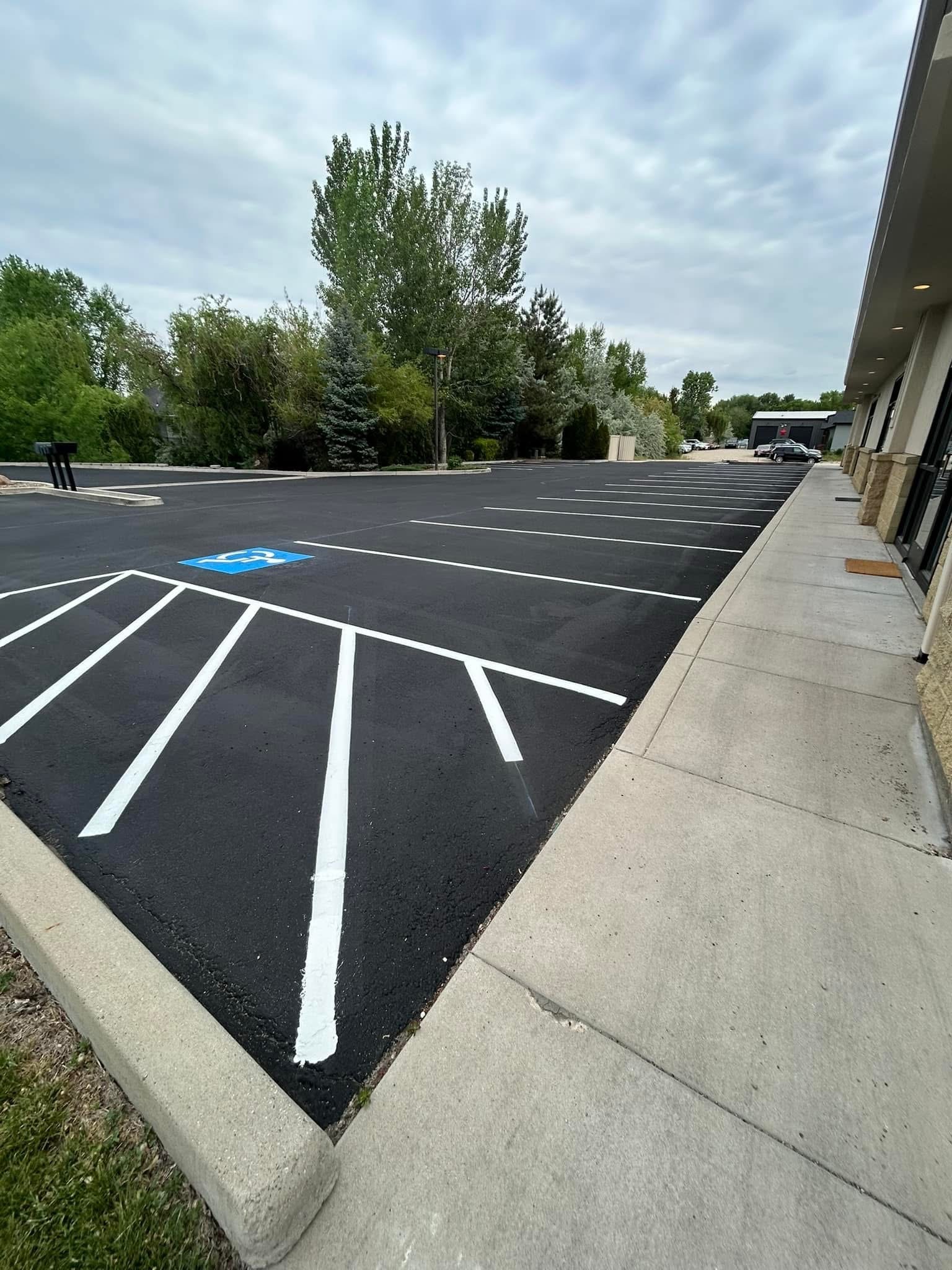 Bright fresh parking lot striping detail on commercial lot