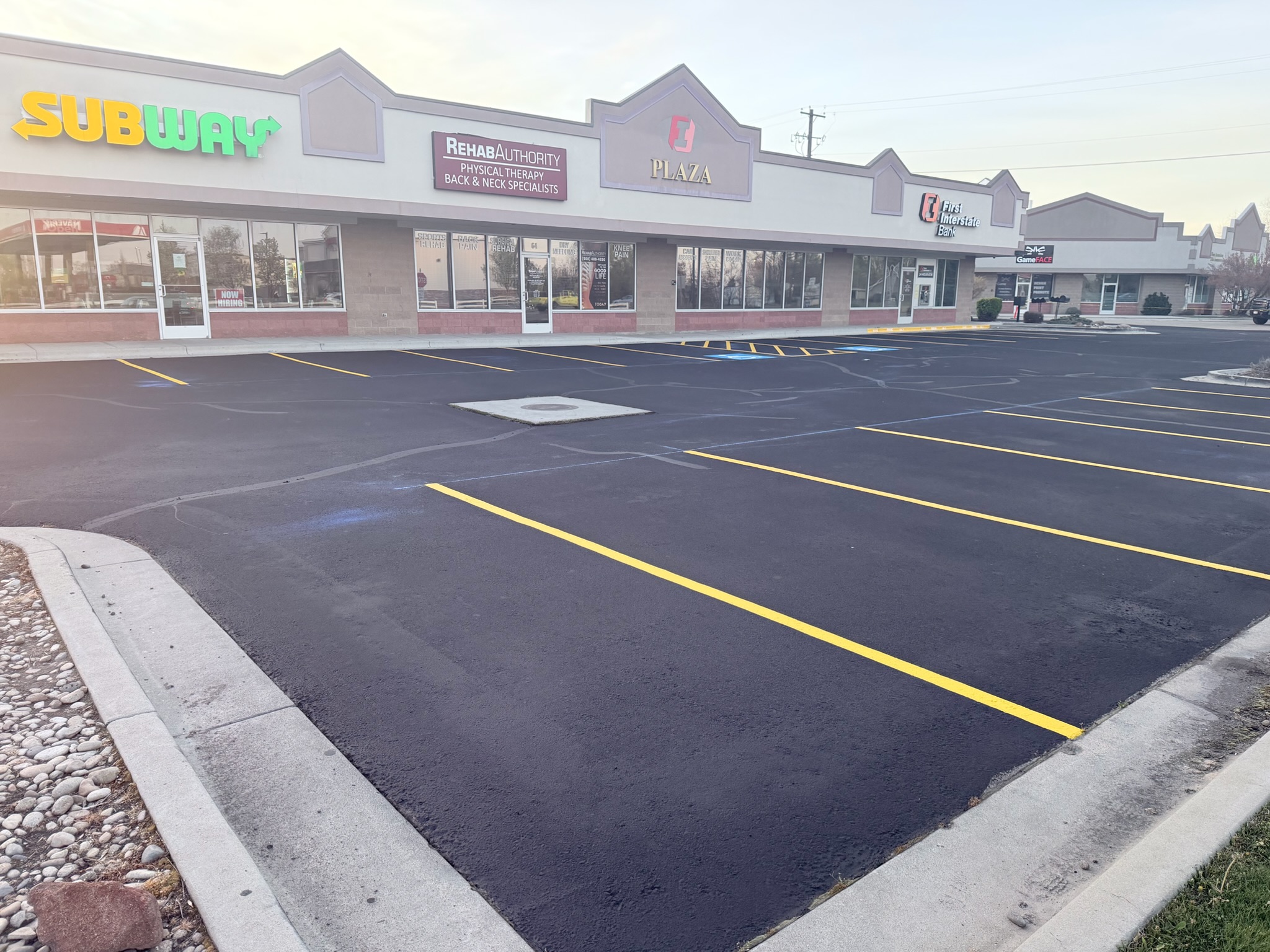 Commercial parking lot after pothole repair