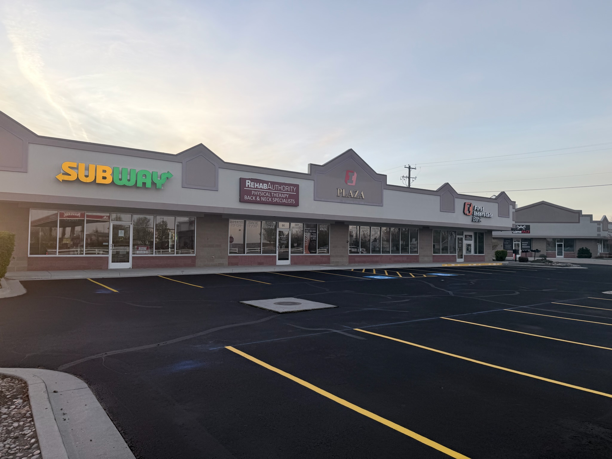 Subway and H&R Block Plaza parking lot freshly striped by Supreme Seal Coat in Meridian, Idaho